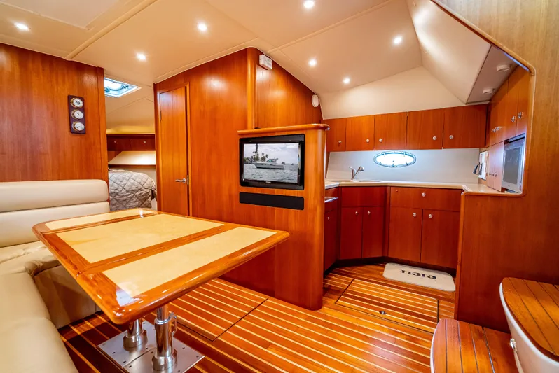  Yacht Photos Pics Luxurious 2005 Tiara Yachts 4200 Open interior with wood finish and modern amenities.
