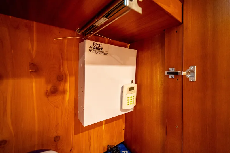  Yacht Photos Pics Security system inside a wooden cabinet on a 2005 Tiara Yachts 4200 Open.