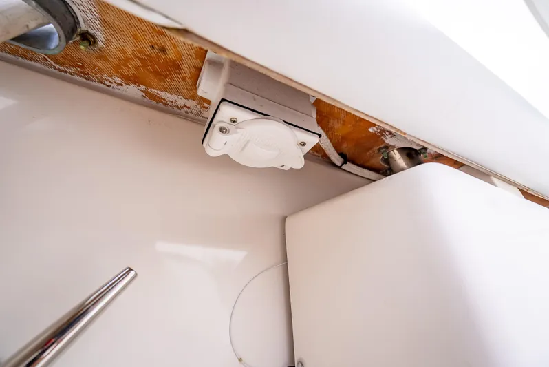  Yacht Photos Pics 2005 Tiara Yachts 4200 Open interior detail, showcasing electrical outlet and structural components.