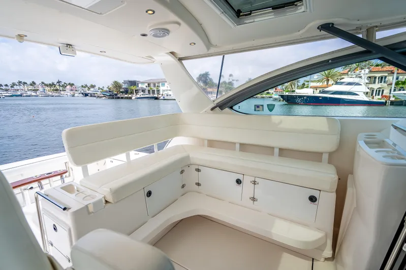  Yacht Photos Pics 2005 Tiara Yachts 4200 Open interior with white seating and waterfront view.