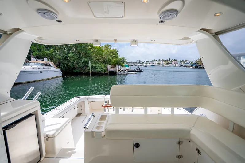  Yacht Photos Pics 2005 Tiara Yachts 4200 Open interior, featuring spacious seating and scenic marina view.