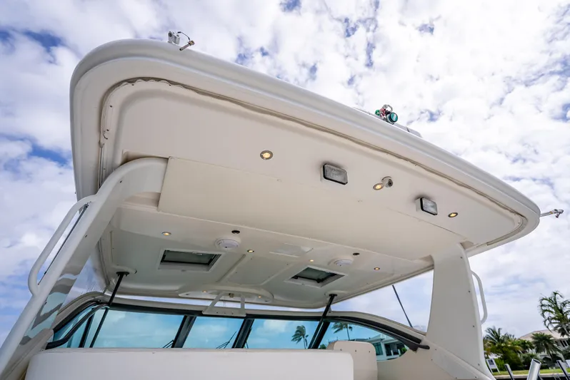  Yacht Photos Pics 2005 Tiara Yachts 4200 Open boat, showcasing sleek design and modern features under a cloudy sky.