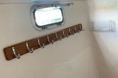 Casuarina Yacht Photos Pics Wall hooks and window inside 2000 Voyage Yachts Norseman 430.