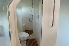 Casuarina Yacht Photos Pics Bathroom interior of 2000 Voyage Yachts Norseman 430 with shower and toilet.