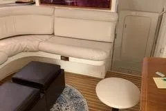 Casuarina Yacht Photos Pics Interior of 2000 Voyage Yachts Norseman 430 with beige seating and wooden flooring.