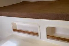 Casuarina Yacht Photos Pics Interior cabin of 2000 Voyage Yachts Norseman 430 with wooden shelves.