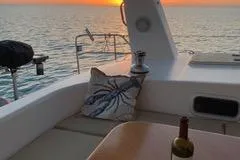 Casuarina Yacht Photos Pics Sunset view from Voyage Yachts Norseman 430, 2000 model, with wine on deck.