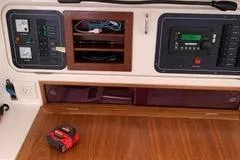 Casuarina Yacht Photos Pics Control panel of 2000 Voyage Yachts Norseman 430 with wooden finish and electronic equipment.