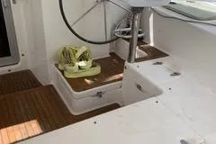 Casuarina Yacht Photos Pics Cockpit of 2000 Voyage Yachts Norseman 430 with wooden flooring and steering wheel.