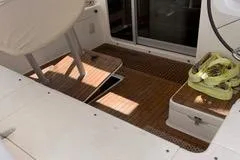 Casuarina Yacht Photos Pics Interior view of 2000 Voyage Yachts Norseman 430 with wooden flooring and seating area.