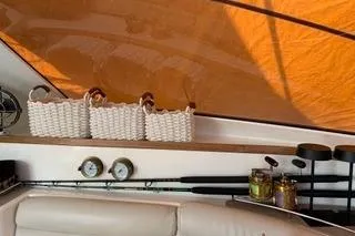 Casuarina Yacht Photos Pics Interior of 2000 Voyage Yachts Norseman 430 with wicker baskets and nautical instruments.