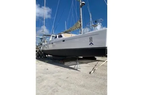 Casuarina Yacht Photos Pics 2000 Voyage Yachts Norseman 430 sailboat on dry dock under clear blue sky.