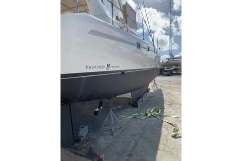 Casuarina Yacht Photos Pics Voyage Yachts Norseman 430 sailboat, 2000 model, on dry dock under clear sky.