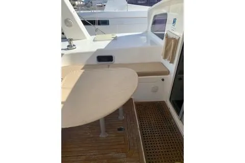 Casuarina Yacht Photos Pics 2000 Voyage Yachts Norseman 430 deck with seating and table.