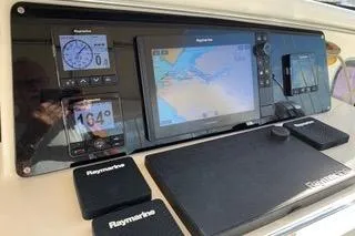 Casuarina Yacht Photos Pics Control panel of 2000 Voyage Yachts Norseman 430 with Raymarine navigation displays.