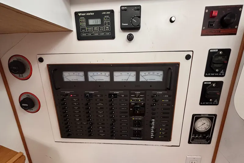 Custom Yacht Photos Pics Electrical control panel on a 2000 Sabre 452 yacht, featuring gauges and switches.