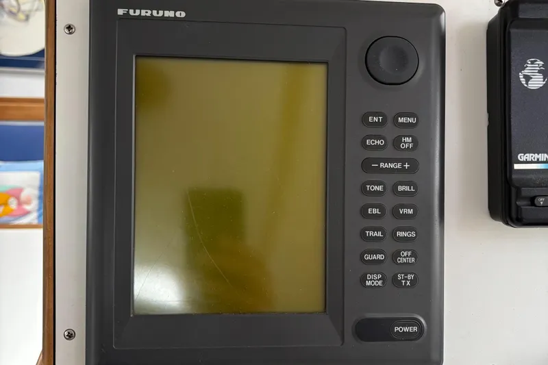 Custom Yacht Photos Pics Furuno marine navigation device with buttons and screen, Sabre 452, 2000 model.