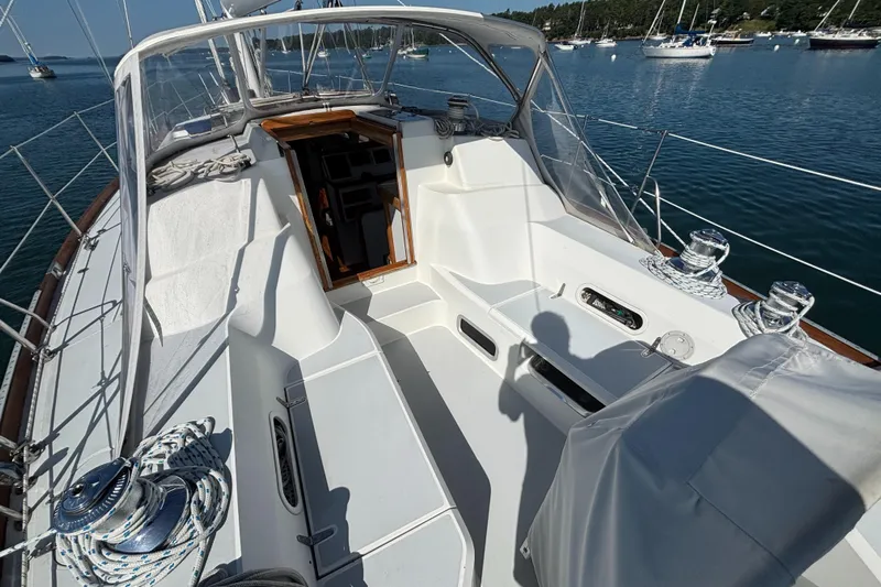 Custom Yacht Photos Pics Sailboat cockpit view, Sabre 452, 2000 model, docked in a serene harbor.