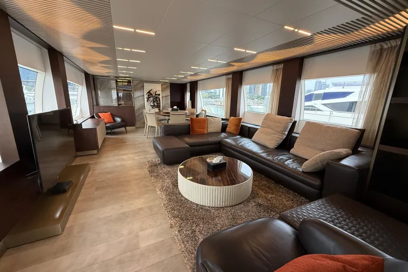 Ferretti 850 Yacht Photos Pics Luxurious interior of 2017 Ferretti Yachts 850 with modern furnishings and large windows.