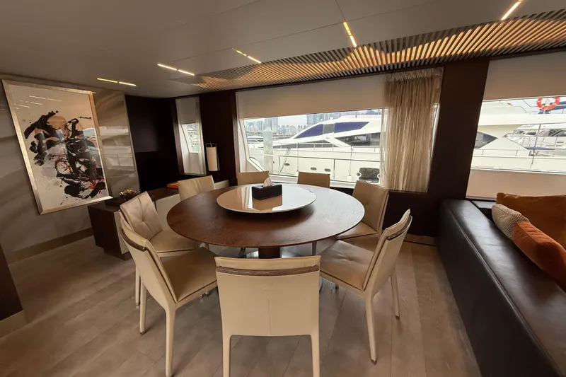Ferretti 850 Yacht Photos Pics Luxurious interior of 2017 Ferretti Yachts 850 with elegant dining area and modern decor.