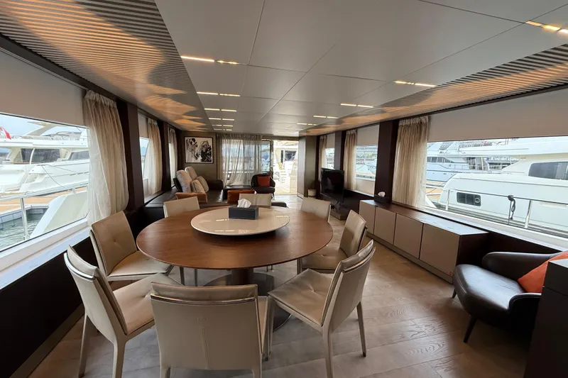 Ferretti 850 Yacht Photos Pics Luxurious interior of 2017 Ferretti Yachts 850 with elegant dining area and large windows.