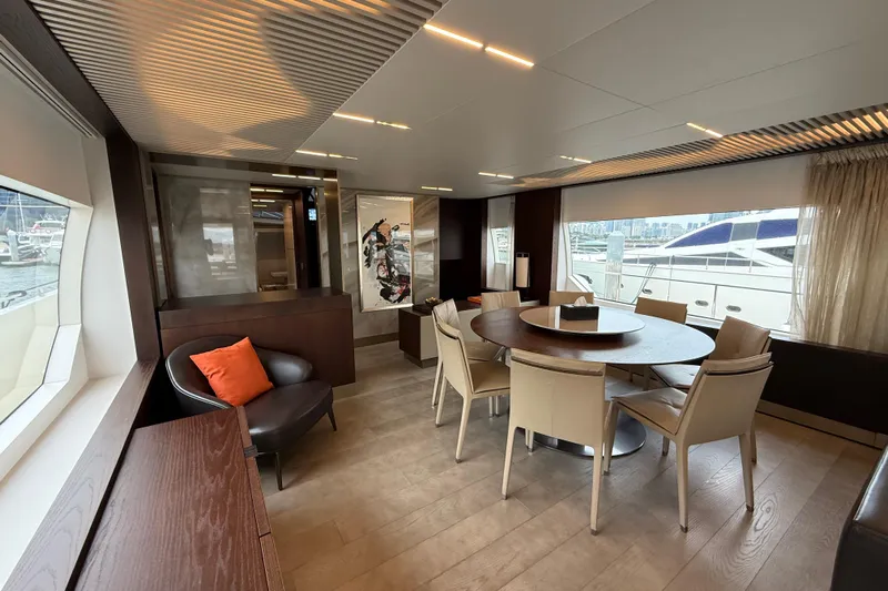 Ferretti 850 Yacht Photos Pics Luxurious interior of 2017 Ferretti Yachts 850 with elegant dining area and modern decor.