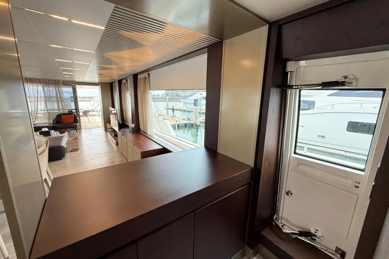 Ferretti 850 Yacht Photos Pics Luxurious interior of 2017 Ferretti Yachts 850 with modern design and marina view.