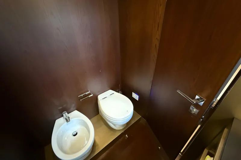 Ferretti 850 Yacht Photos Pics Luxurious bathroom in 2017 Ferretti Yachts 850, featuring modern toilet and bidet.