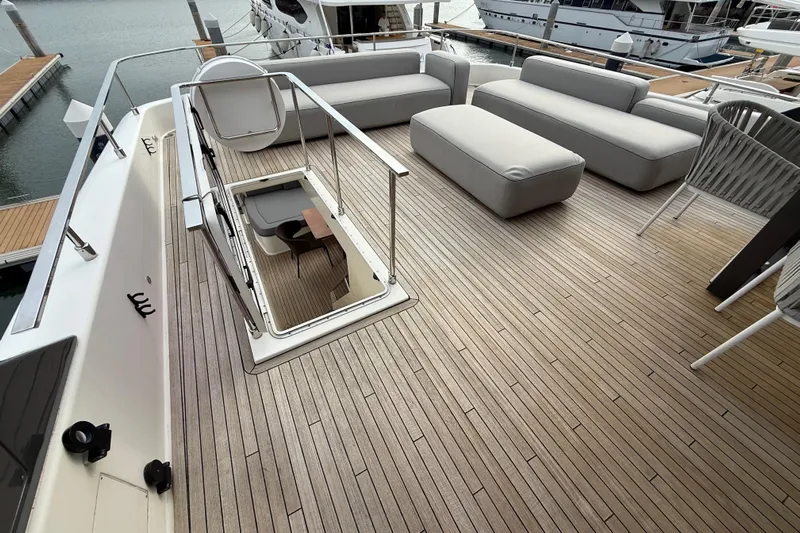 Ferretti 850 Yacht Photos Pics Luxurious 2017 Ferretti Yachts 850 deck with modern seating and elegant wood flooring.