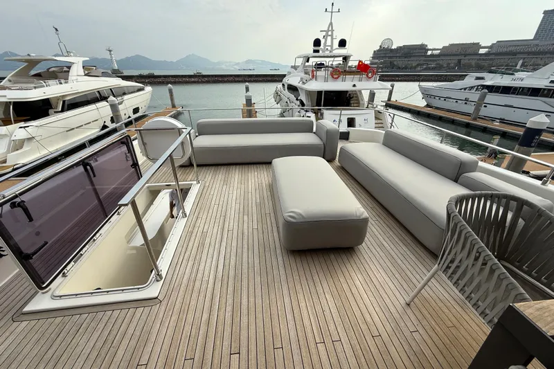 Ferretti 850 Yacht Photos Pics Luxurious 2017 Ferretti Yachts 850 deck with modern seating, docked at marina.