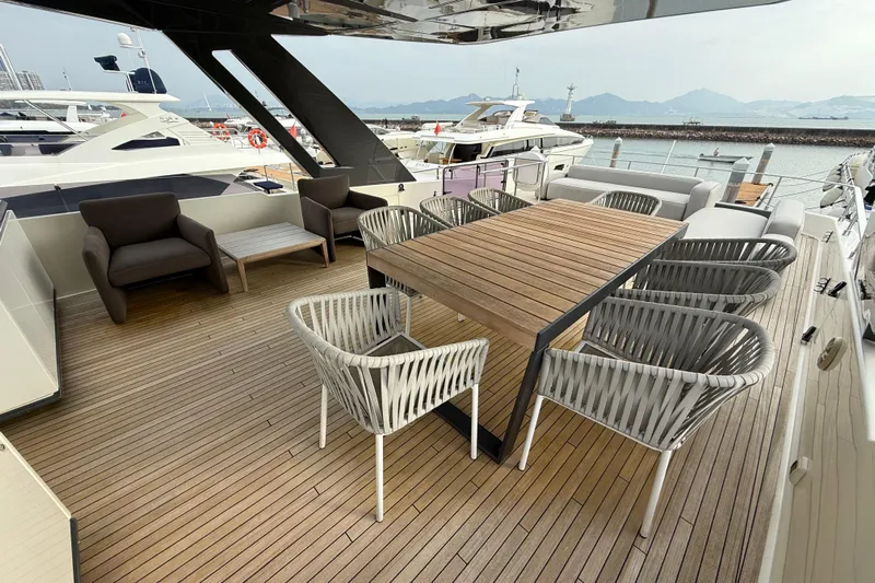 Ferretti 850 Yacht Photos Pics Luxurious deck of 2017 Ferretti Yachts 850 with elegant seating and ocean view.