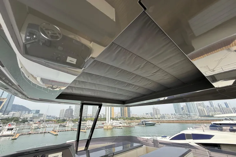 Ferretti 850 Yacht Photos Pics Luxurious 2017 Ferretti Yachts 850 with city skyline and marina view.