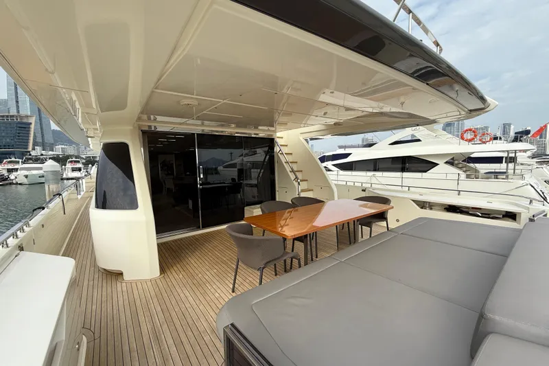 Ferretti 850 Yacht Photos Pics Luxurious 2017 Ferretti Yachts 850 deck with elegant seating and marina view.
