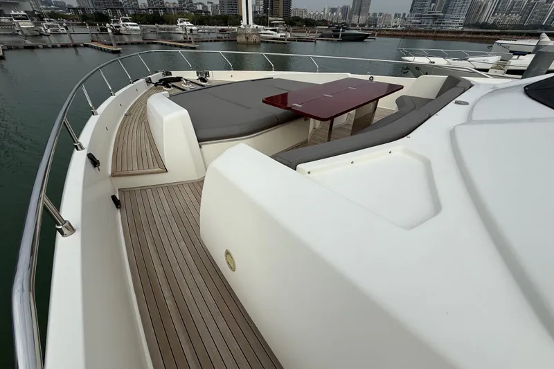 Ferretti 850 Yacht Photos Pics Luxurious 2017 Ferretti Yachts 850 with elegant deck and seating area in marina.