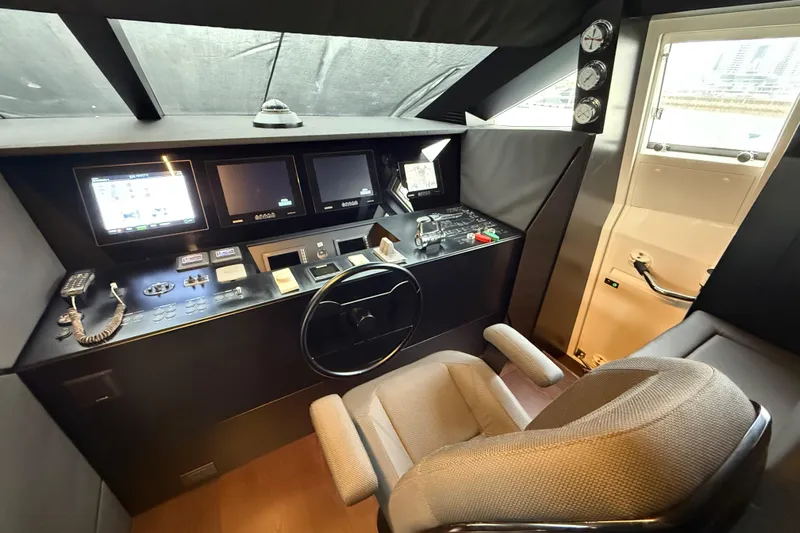 Ferretti 850 Yacht Photos Pics Cockpit of 2017 Ferretti Yachts 850 with modern navigation equipment and controls.