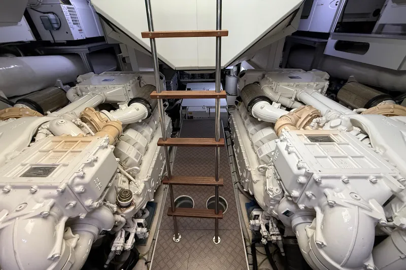Ferretti 850 Yacht Photos Pics Engine room of 2017 Ferretti Yachts 850, featuring dual engines and ladder access.