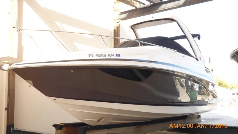  Yacht Photos Pics 2018 Regal 28 Express boat in storage, side view.