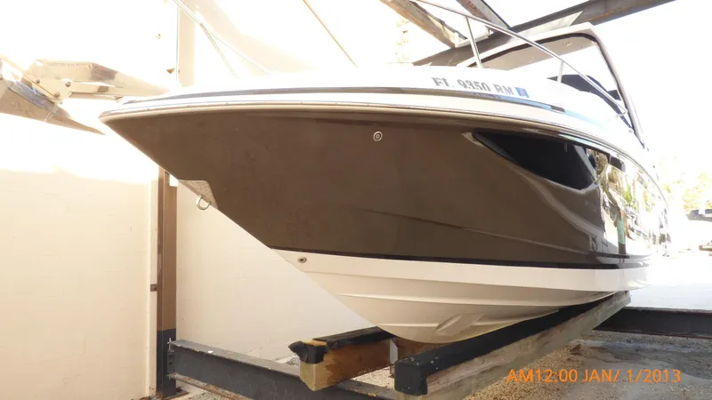  Yacht Photos Pics 2018 Regal 28 Express boat on a trailer, side view.