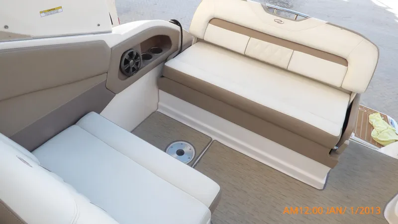  Yacht Photos Pics Interior seating of 2018 Regal 28 Express boat with beige upholstery.