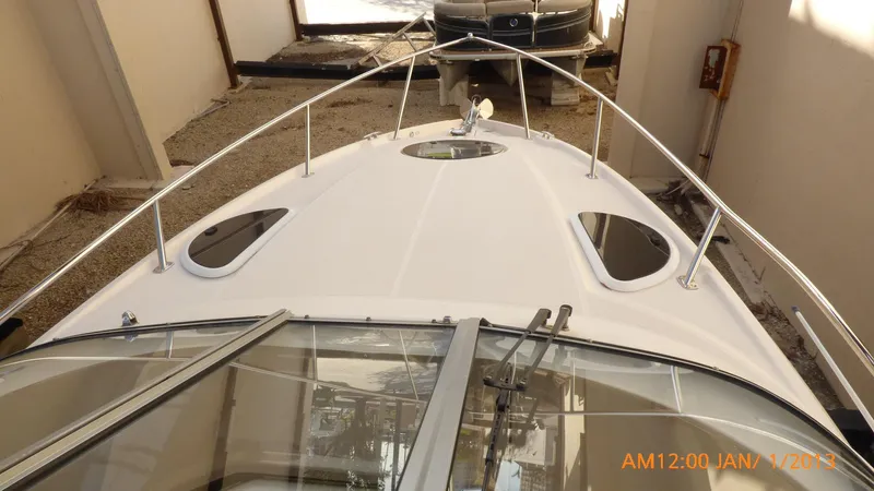  Yacht Photos Pics 2018 Regal 28 Express boat, top view, docked indoors.