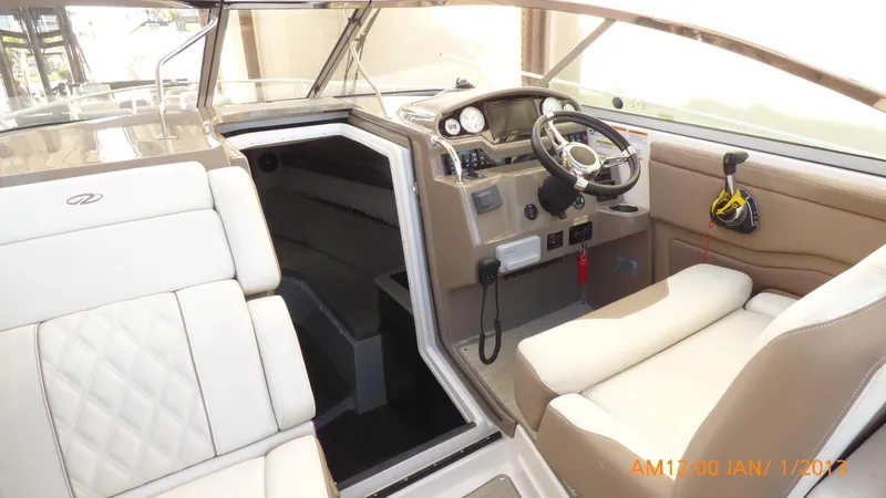  Yacht Photos Pics Interior of 2018 Regal 28 Express boat with modern helm and seating.
