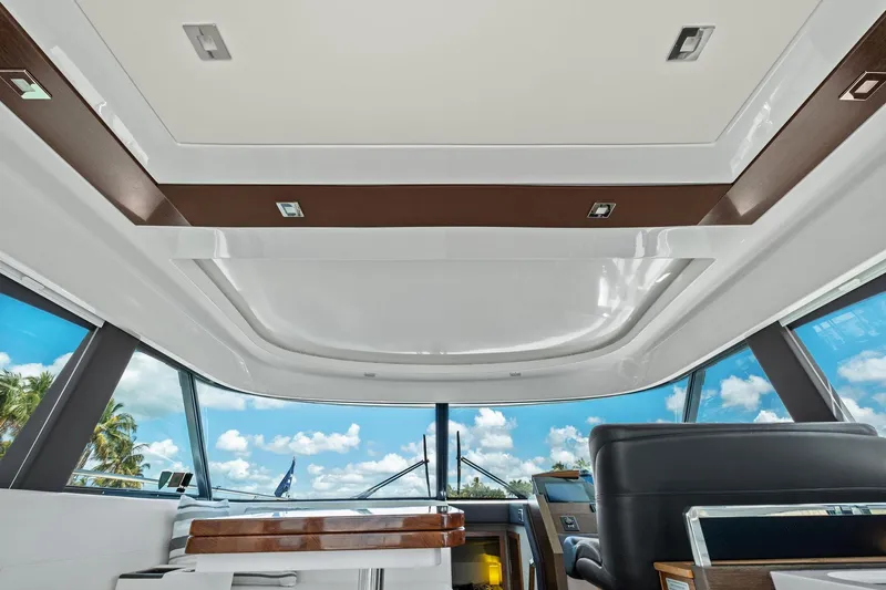 Southwind Yacht Photos Pics Interior view of 2018 Tiara Yachts C44 Coupe, featuring sleek design and panoramic windows.
