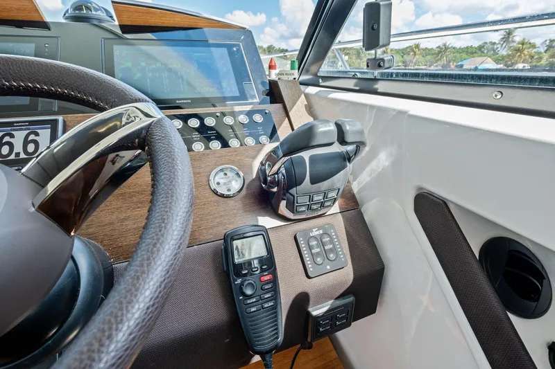 Southwind Yacht Photos Pics 2018 Tiara Yachts C44 Coupe helm with advanced navigation and control systems.