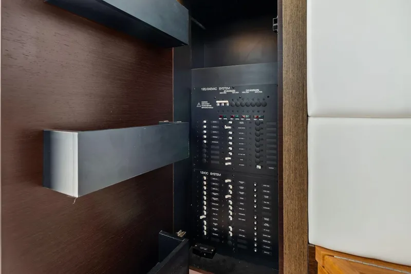 Southwind Yacht Photos Pics Electrical panel inside 2018 Tiara Yachts C44 Coupe, showcasing control systems.