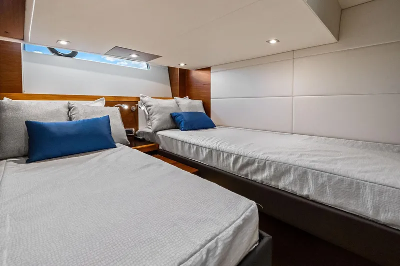 Southwind Yacht Photos Pics 2018 Tiara Yachts C44 Coupe cabin with twin beds and modern decor.