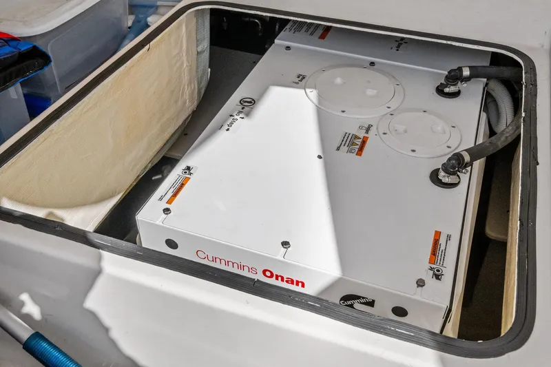 Southwind Yacht Photos Pics Cummins Onan generator in 2018 Tiara Yachts C44 Coupe engine compartment.