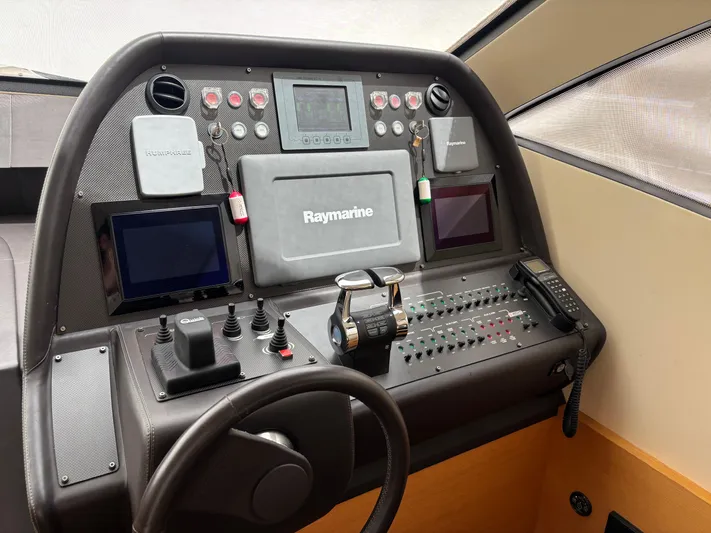  Yacht Photos Pics Control panel of a 2011 Pershing 64 yacht with Raymarine navigation system.