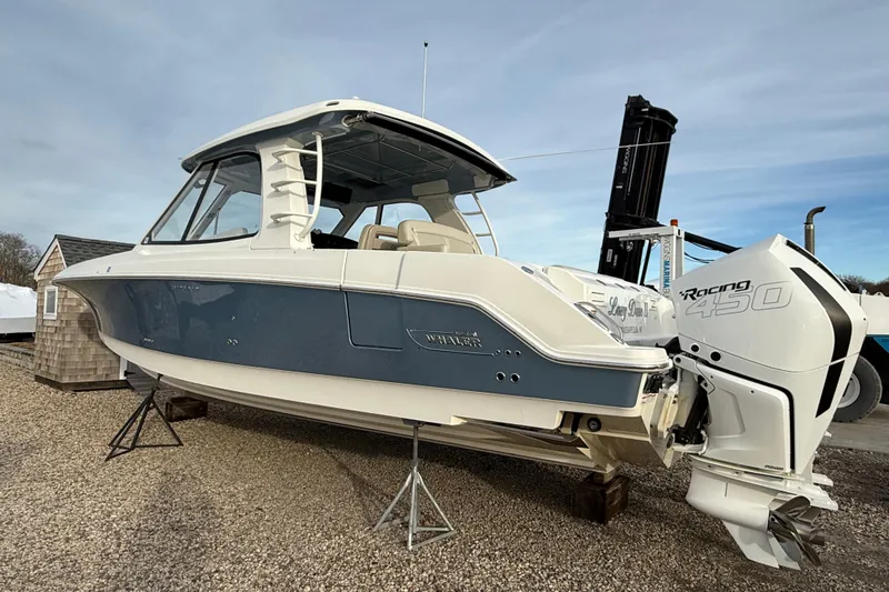 Siper Brokerage Yacht Photos Pics 2021 Boston Whaler 380 Realm boat with Racing 450 engine on display.