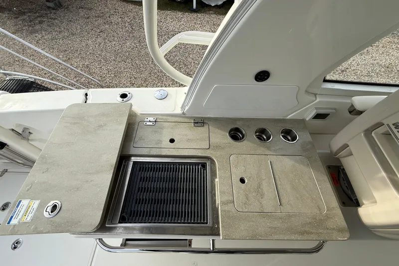 Siper Brokerage Yacht Photos Pics 2021 Boston Whaler 380 Realm boat kitchen area with grill and countertop.
