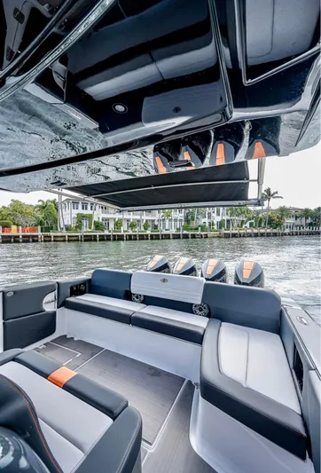  Yacht Photos Pics 2023 Cigarette 41 Nighthawk boat interior with sleek seating and modern design on the water.